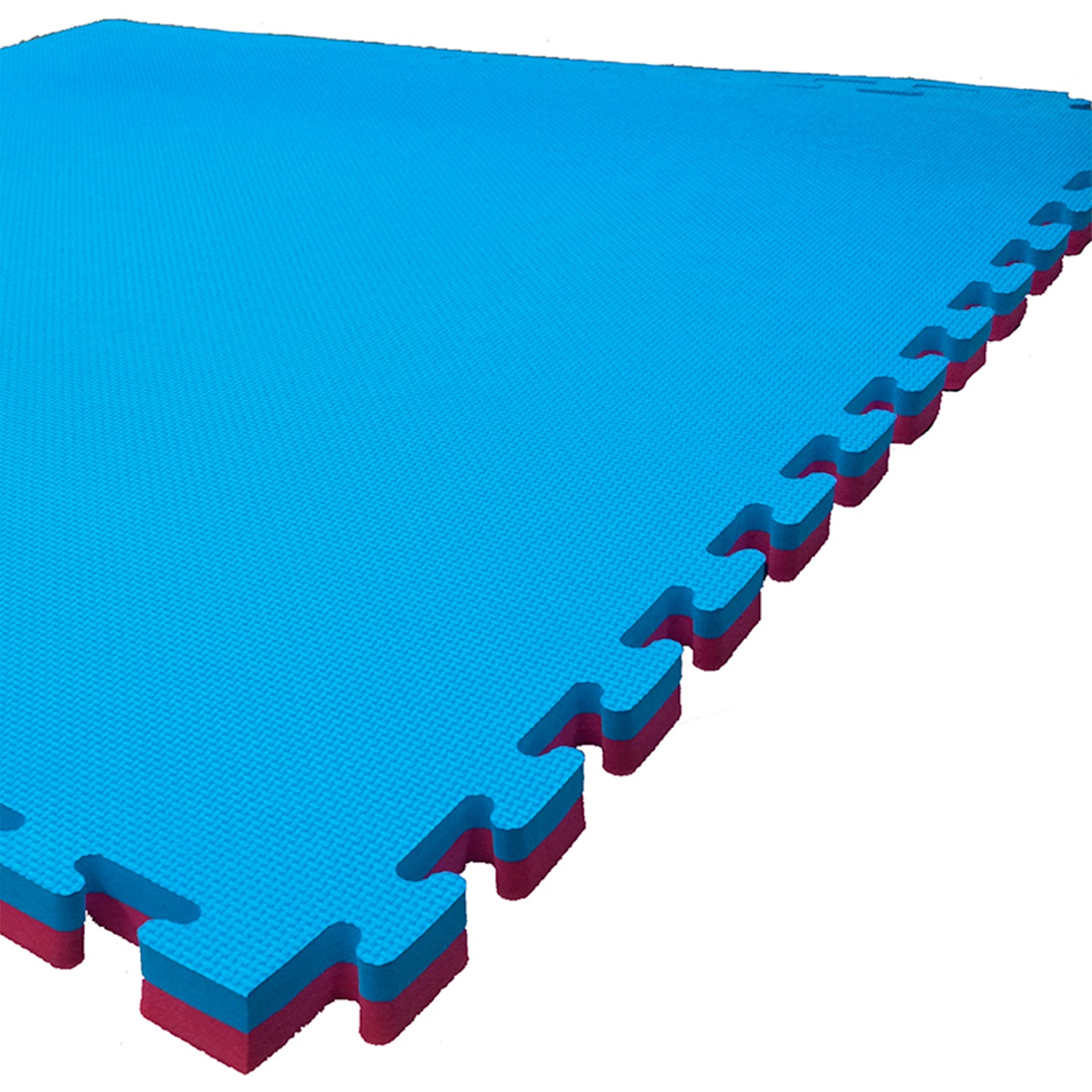 Detalle de unión tipo encastre de tatami EVA modular azul y rojo para instalación de pisos deportivos
