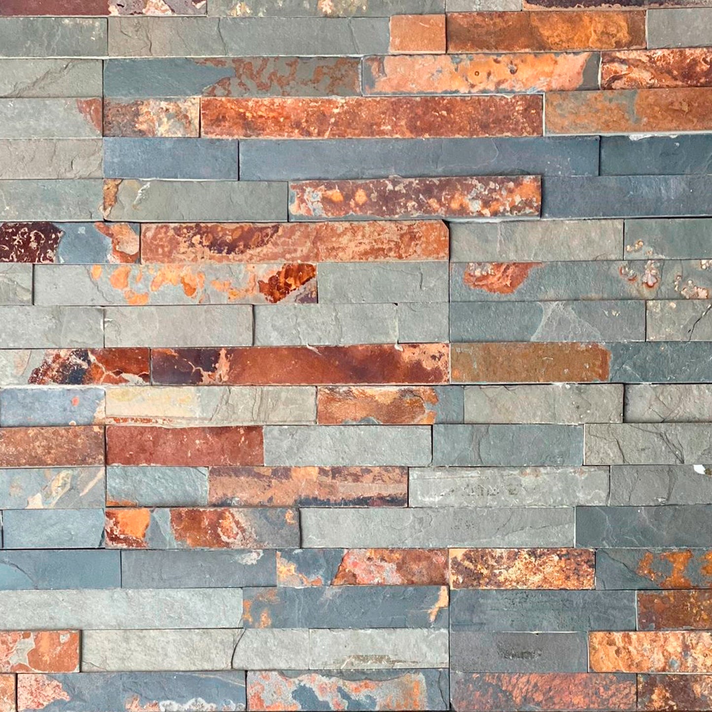 Vista frontal fachaleta Indo Oxidada en piedra natural formato palmeta 15x55 cm