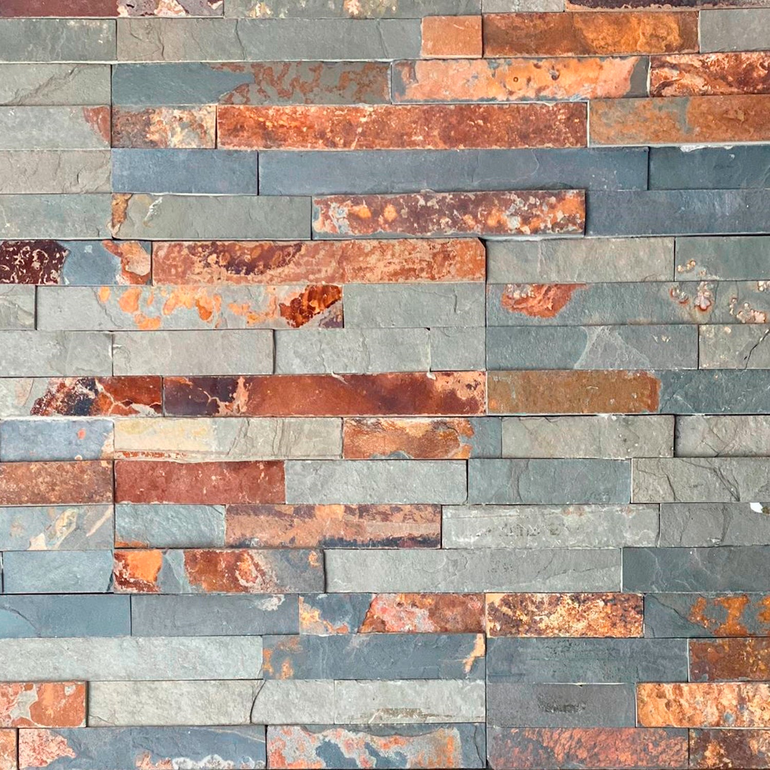 Vista frontal fachaleta Indo Oxidada en piedra natural formato palmeta 15x55 cm